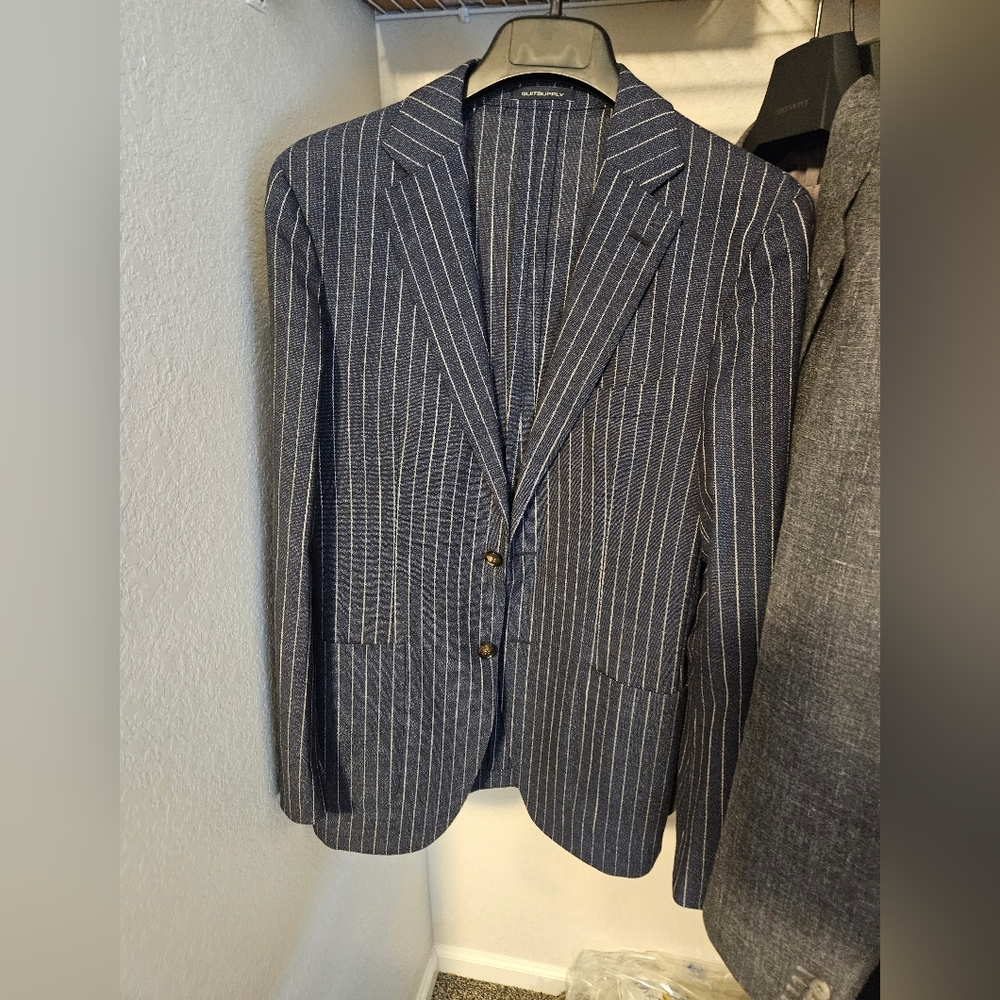 Suitsupply Traveller Suit. Navy pin stripe. 40R